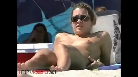 Beach voyeur Part 28
