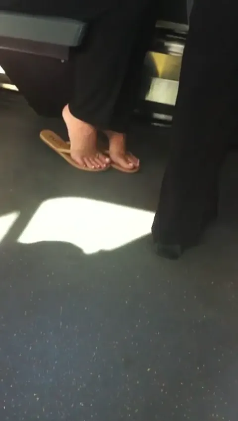 blonde's sexy candid feet in flipflops Part 4