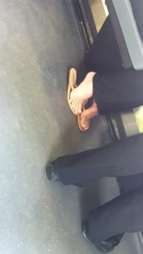 blonde's sexy candid feet in flipflops Part 5