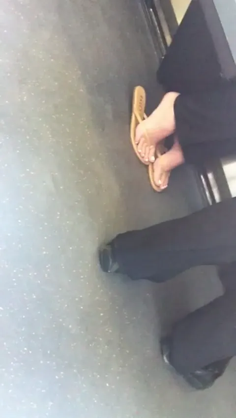 blonde's sexy candid feet in flipflops Part 6