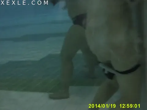 Public Nude pool spy 1 woman masturbate water jet Part 1