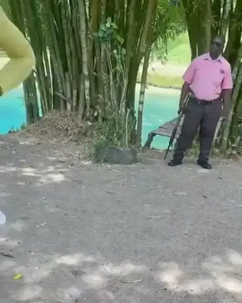 Sexy African Girl Passes by Camera Part 1