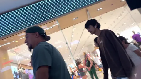 Upskirt - Denim Skirt Latina on the Escalator Part 1