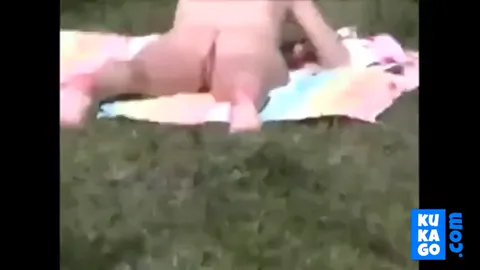 Voyeur - Guy get caught filming a nude sunbathing Part 4